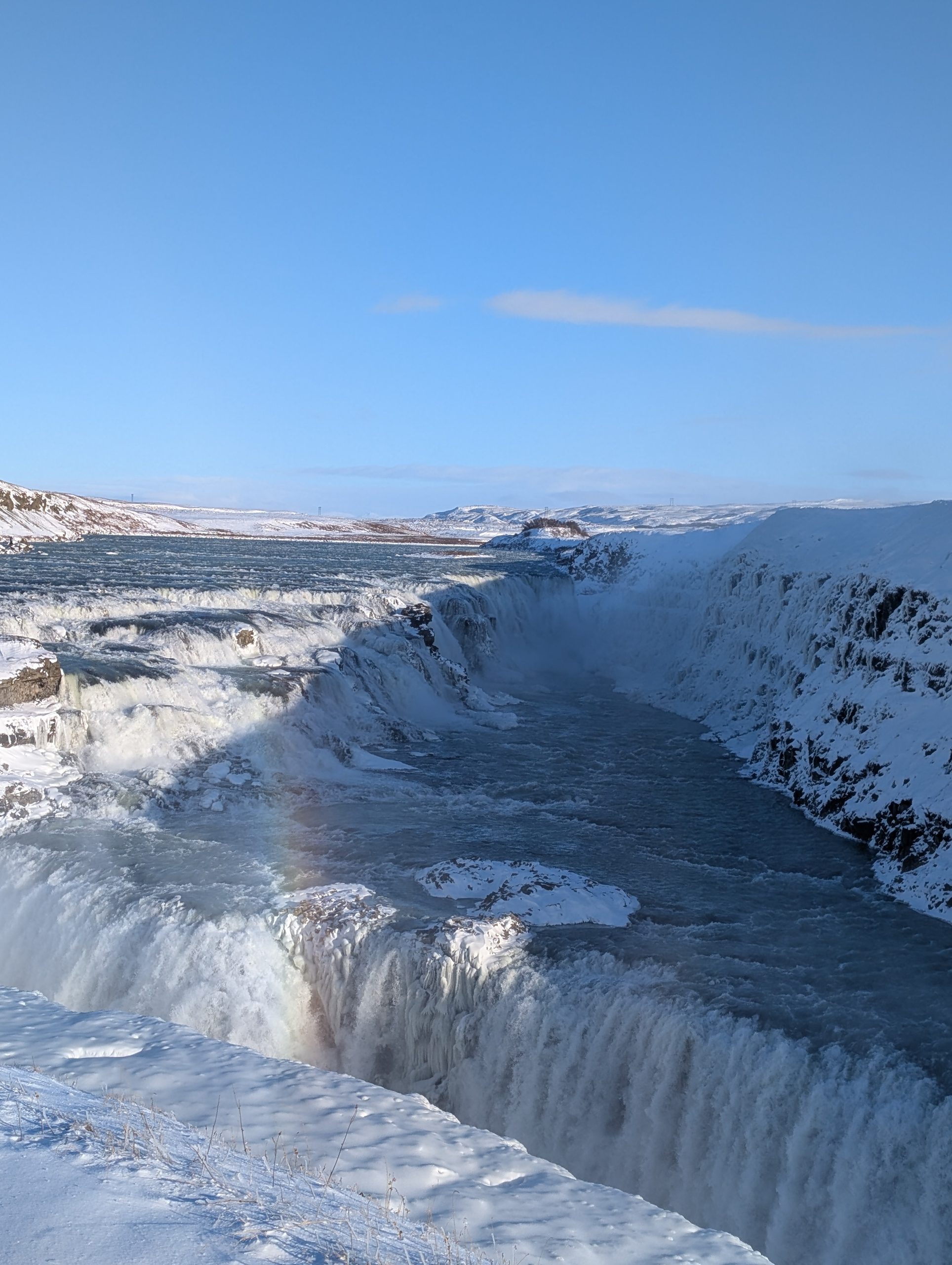 Gullfoss waterfall in winter with rainbow, Iceland