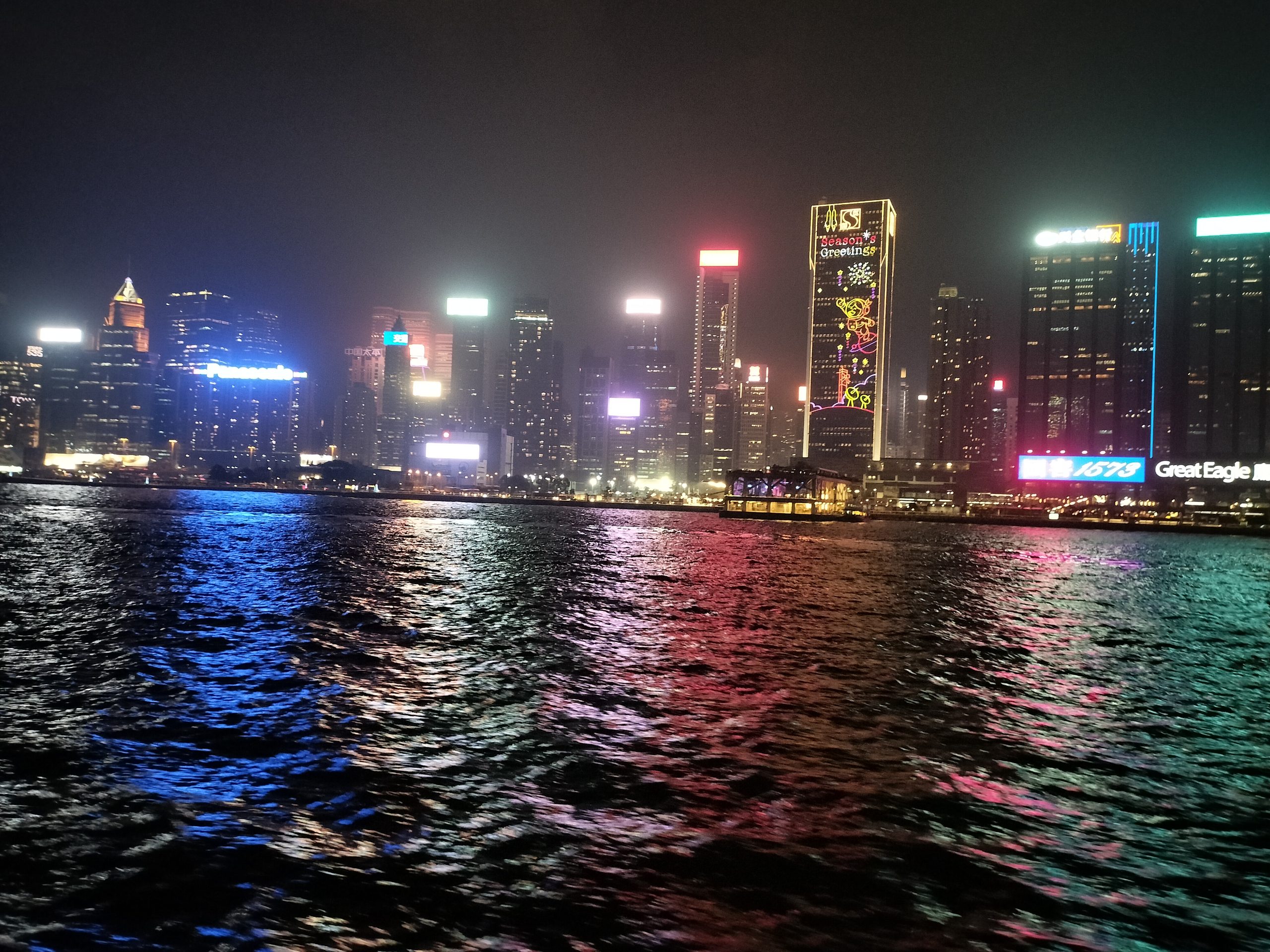 Victoria Harbour night skyline from Tsim Sha Tsui promenade, Hong Kong